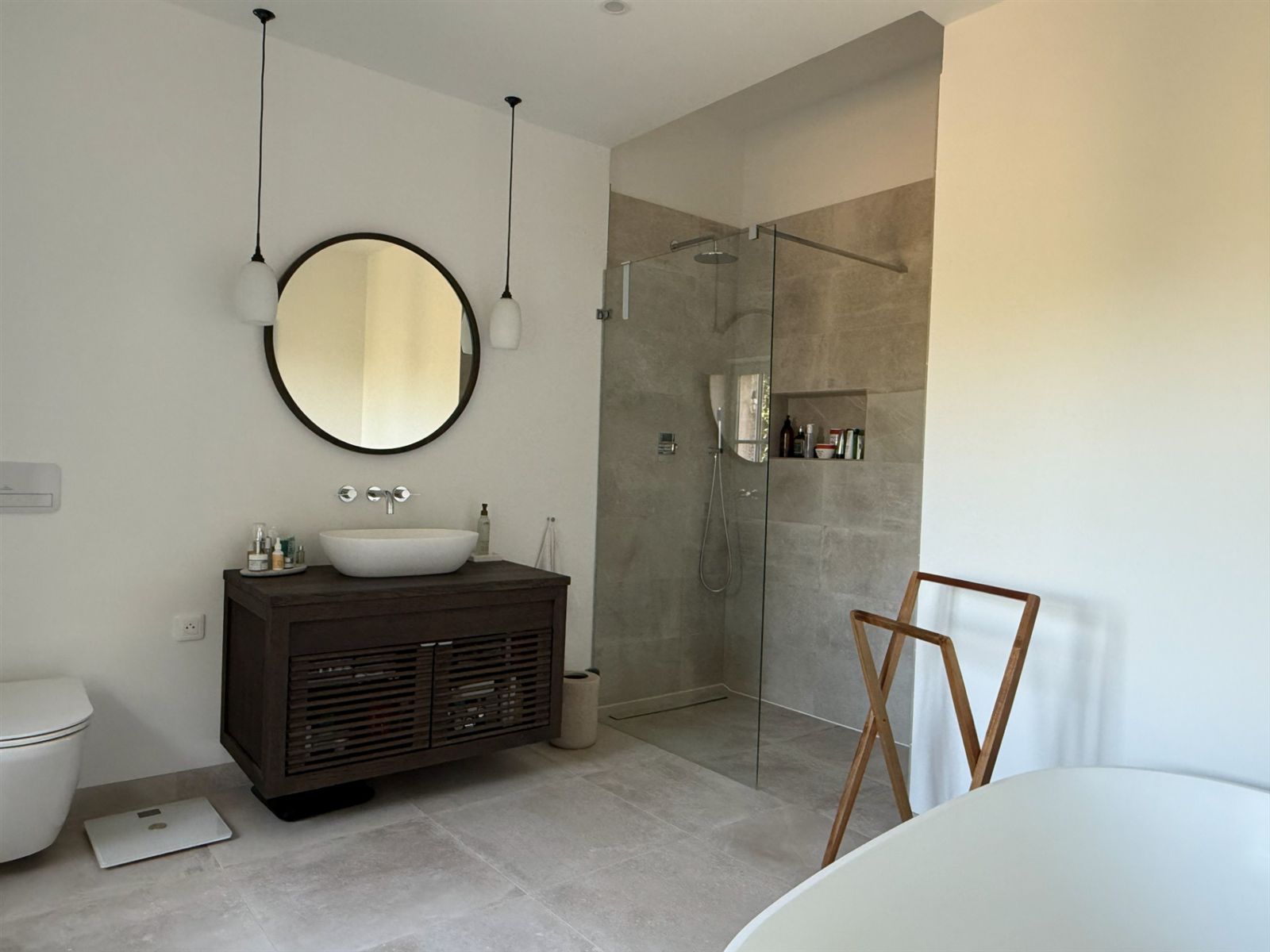 Master en suite vanity, walk-in shower and freestanding bath